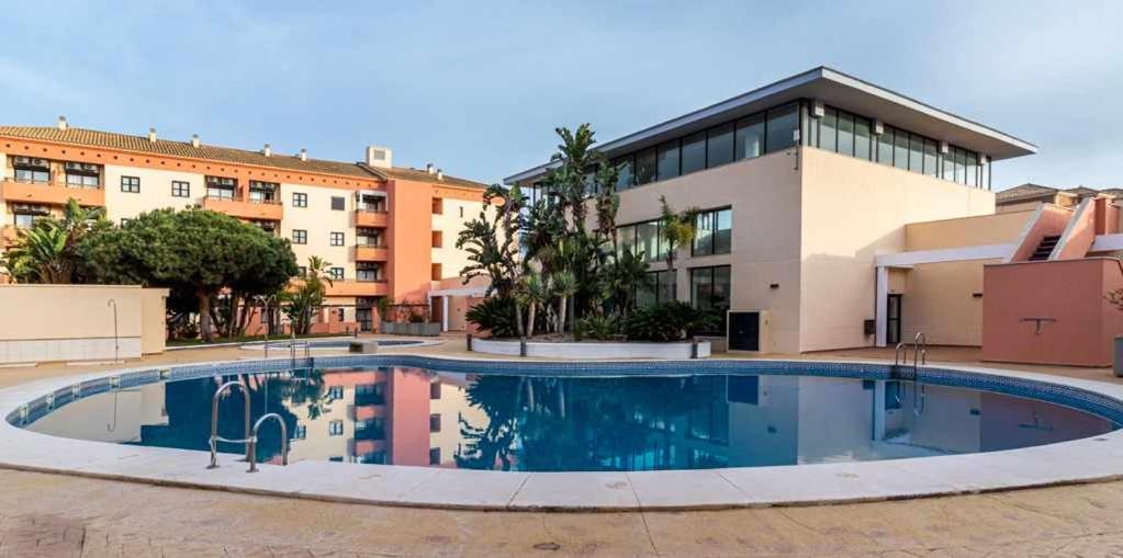 Apartamento junto a la playa con piscina y parking Apartamento Punta Umbría Exterior foto